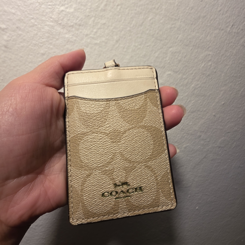 SOLD!  Coach Tan Lanyards
